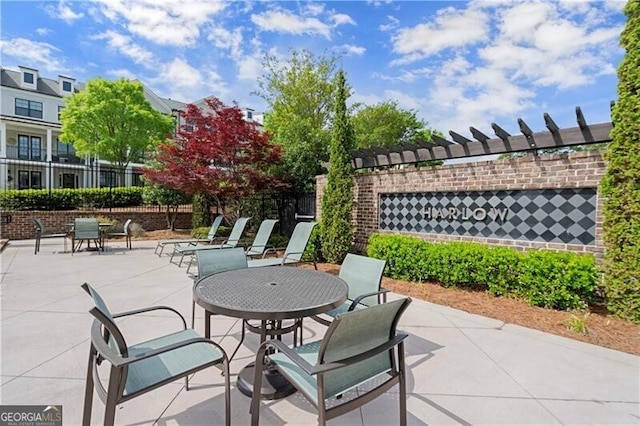 1074 Heyward Way, Alpharetta, GA 30009 - view of patio featuring fence and outdoor dining space