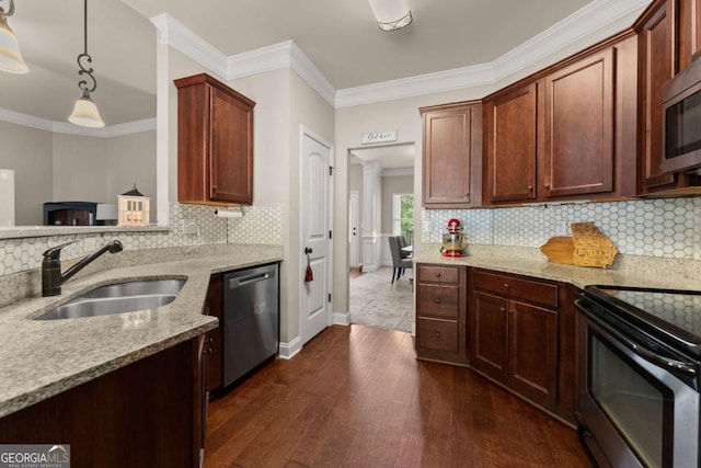 1929 Windstone Pl, Winder, GA 30680 - kitchen with crown molding, appliances with stainless steel finishes, light stone countertops, a sink, and dark wood-style floors