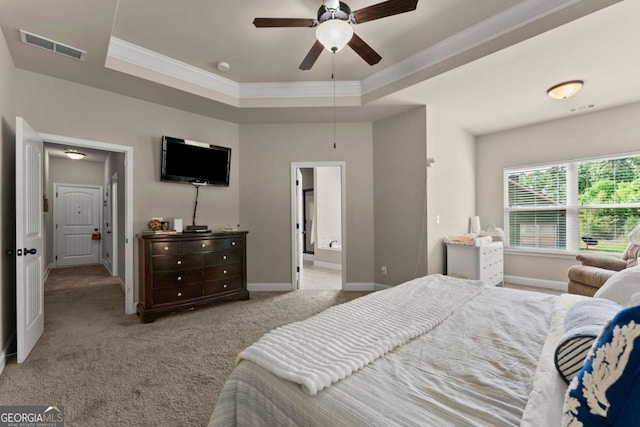 1929 Windstone Pl, Winder, GA 30680 - carpeted bedroom featuring crown molding, a raised ceiling, baseboards, and visible vents