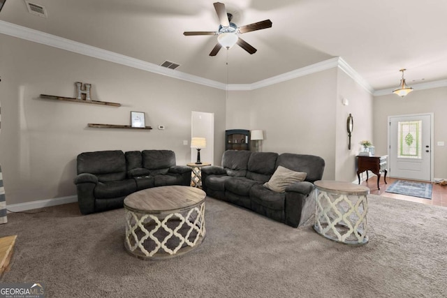 1929 Windstone Pl, Winder, GA 30680 - carpeted living area with visible vents, crown molding, baseboards, and ceiling fan