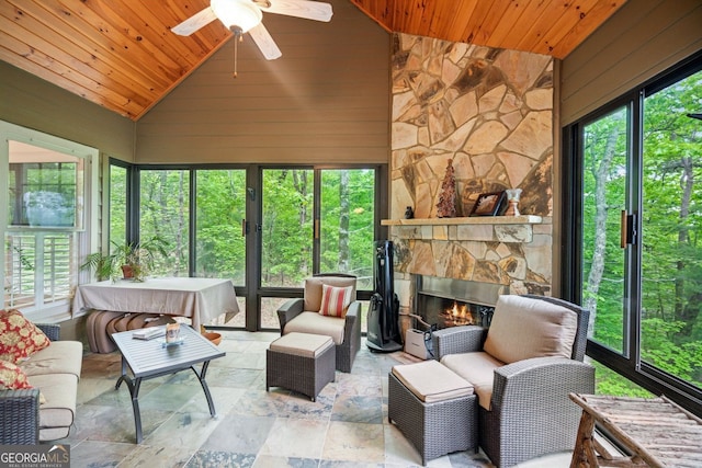 201 Wilderness Knl, Big Canoe, GA 30143 - sunroom with ceiling fan and an outdoor living space with a fireplace