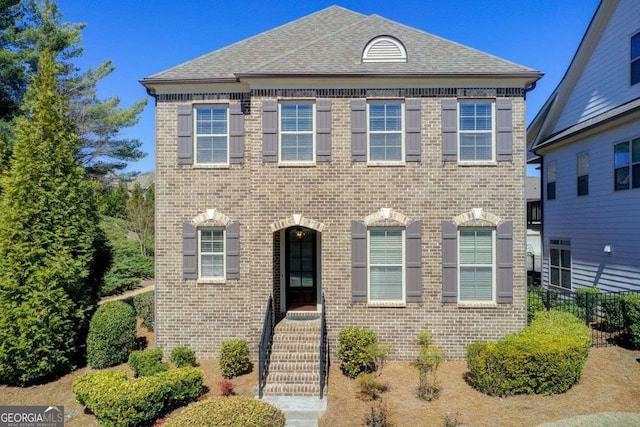 1040 Peyton View Ct, Alpharetta, GA 30004 - view of front of property featuring fence, a shingled roof, and brick siding