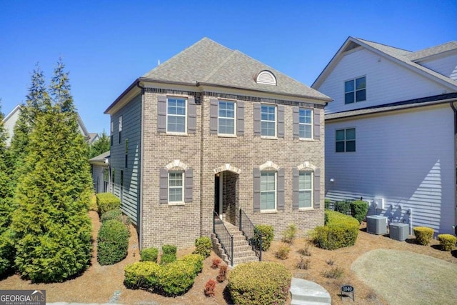 1040 Peyton View Ct, Alpharetta, GA 30004 - view of front of house featuring brick siding and central AC