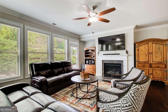 1040 Peyton View Ct, Alpharetta, GA 30004 - living area with a ceiling fan, visible vents, a high end fireplace, dark wood finished floors, and ornamental molding