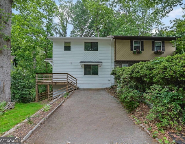 2551 Park Rd SE, Smyrna, GA 30080 - view of front of house with driveway and a deck