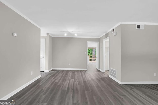 2551 Park Rd SE, Smyrna, GA 30080 - unfurnished room featuring visible vents, rail lighting, baseboards, and dark wood-style floors
