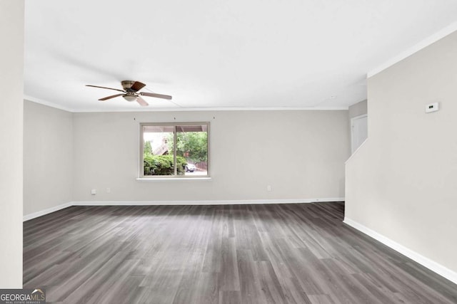 2551 Park Rd SE, Smyrna, GA 30080 - unfurnished room featuring crown molding, ceiling fan, baseboards, and wood finished floors