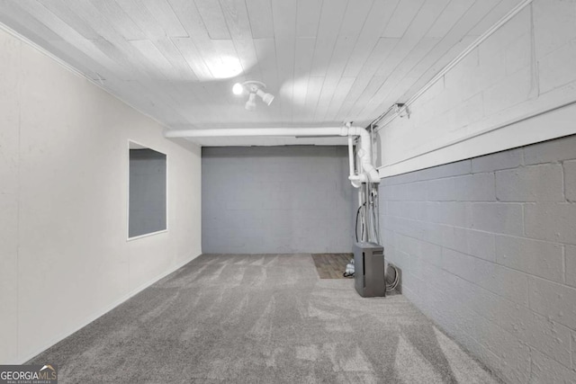 2551 Park Rd SE, Smyrna, GA 30080 - finished basement with concrete block wall, wood ceiling, and carpet