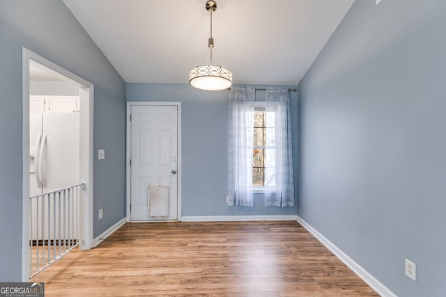 447 Wallace Way, Rockmart, GA 30153 - unfurnished dining area featuring wood finished floors and baseboards
