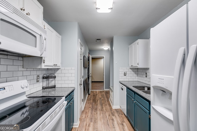 447 Wallace Way, Rockmart, GA 30153 - kitchen featuring white appliances, blue cabinets, white cabinetry, and light wood finished floors