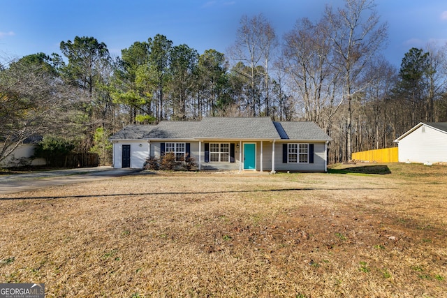 447 Wallace Way, Rockmart, GA 30153 - ranch-style home featuring a front yard, concrete driveway, and view of scattered trees