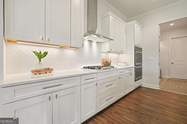 242 Fieldbrook Xing, Canton, GA 30115 - kitchen with wall chimney range hood, crown molding, white cabinets, stainless steel appliances, and dark wood-style floors