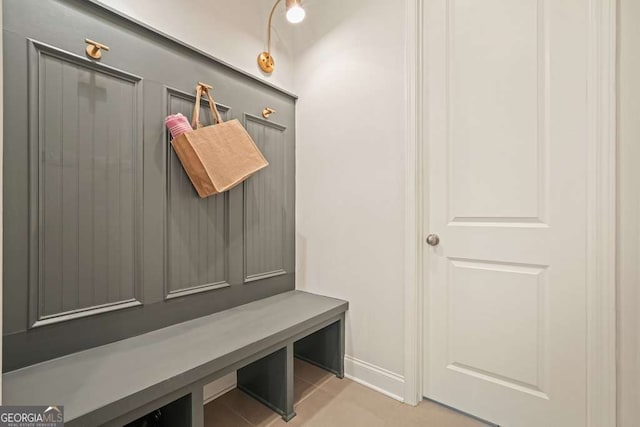 242 Fieldbrook Xing, Canton, GA 30115 - mudroom featuring baseboards and light tile patterned floors