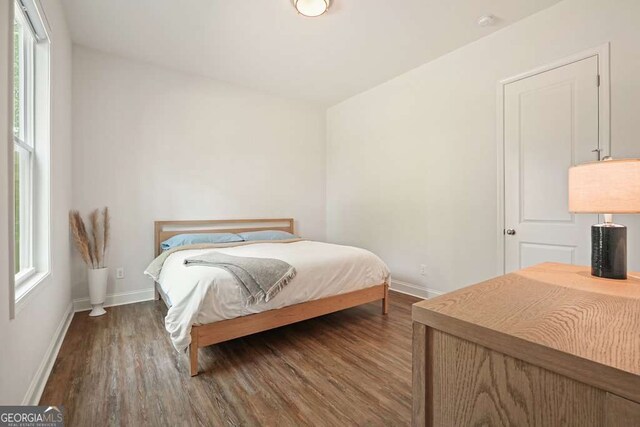 242 Fieldbrook Xing, Canton, GA 30115 - bedroom featuring baseboards and wood finished floors