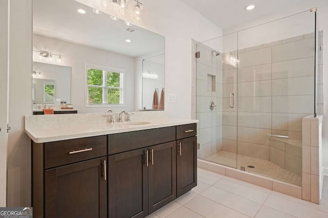 242 Fieldbrook Xing, Canton, GA 30115 - bathroom with vanity, tile patterned floors, a stall shower, and recessed lighting