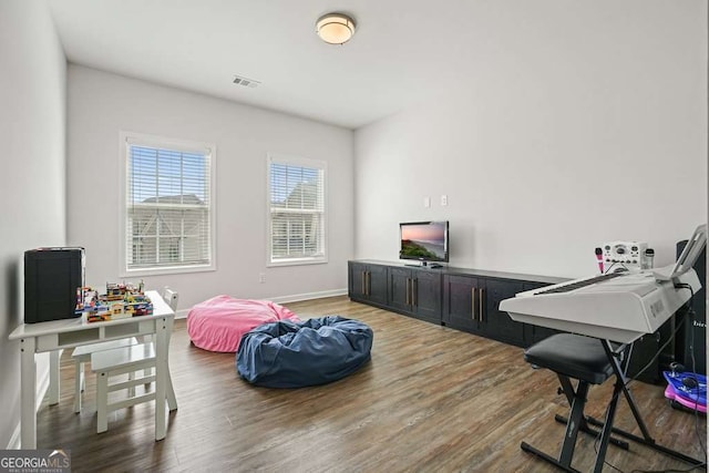 242 Fieldbrook Xing, Canton, GA 30115 - office area with baseboards, wood finished floors, and visible vents
