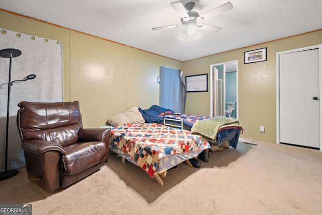 carpeted bedroom with a ceiling fan