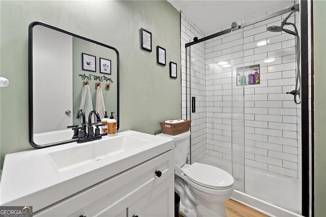 1575 Davis Rd W, Fairmount, GA 30139 - full bath featuring a shower stall, toilet, vanity, and wood finished floors