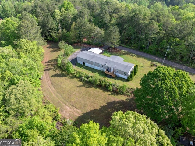 aerial view featuring a forest view