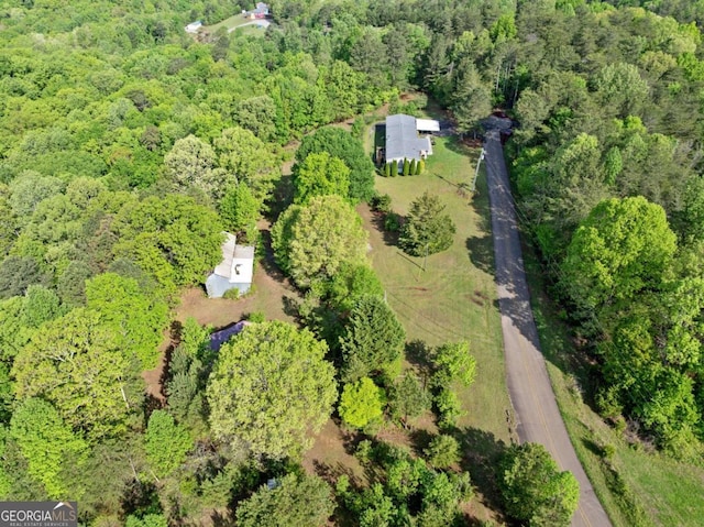 aerial view featuring a forest view