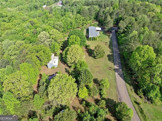 1575 Davis Rd W, Fairmount, GA 30139 - aerial view of property and surrounding area featuring a heavily wooded area