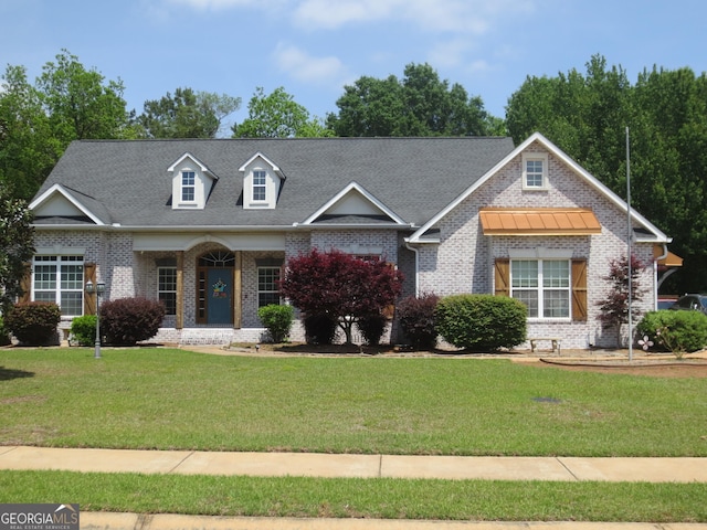 105 Wieland Dr, Kathleen, GA 31047 - view of front of property featuring a front yard and brick siding