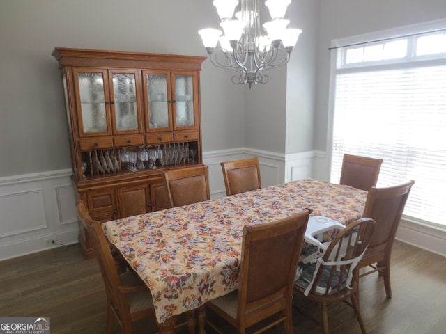 105 Wieland Dr, Kathleen, GA 31047 - dining room featuring a notable chandelier, dark wood-style floors, and a healthy amount of sunlight