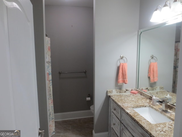 105 Wieland Dr, Kathleen, GA 31047 - bathroom with vanity, baseboards, toilet, and curtained shower