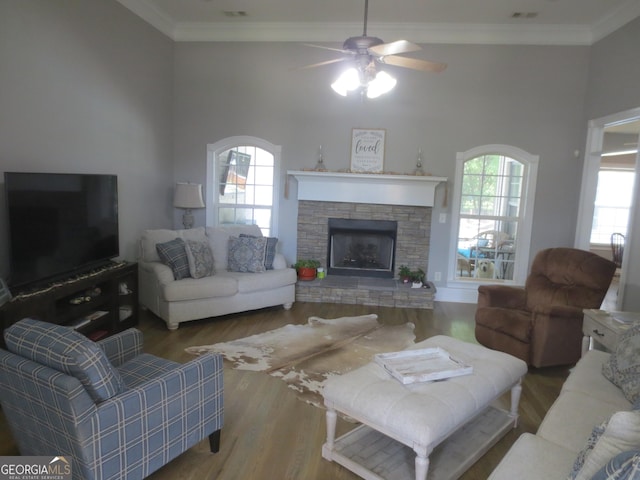 105 Wieland Dr, Kathleen, GA 31047 - living room featuring ornamental molding, a fireplace, a ceiling fan, and wood finished floors