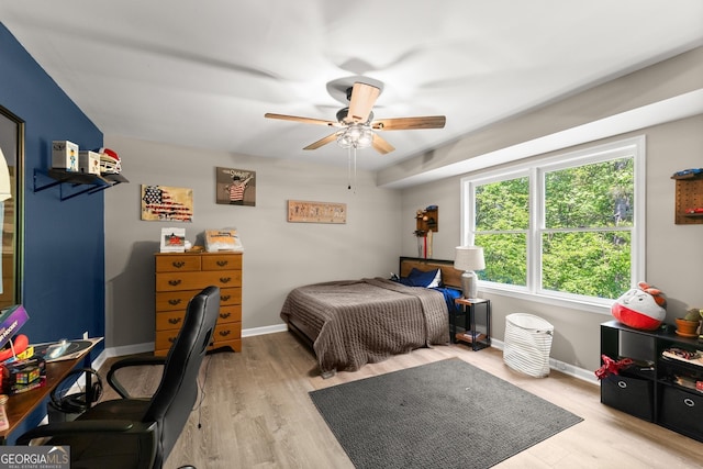 1536 Enota Ave NE, Gainesville, GA 30501 - bedroom with light wood-style flooring and ceiling fan