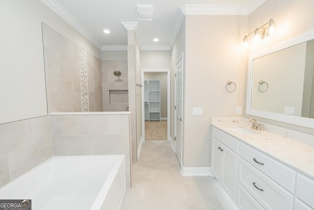 full bathroom with a walk in closet, a bath, a tile shower, vanity, and ornamental molding
