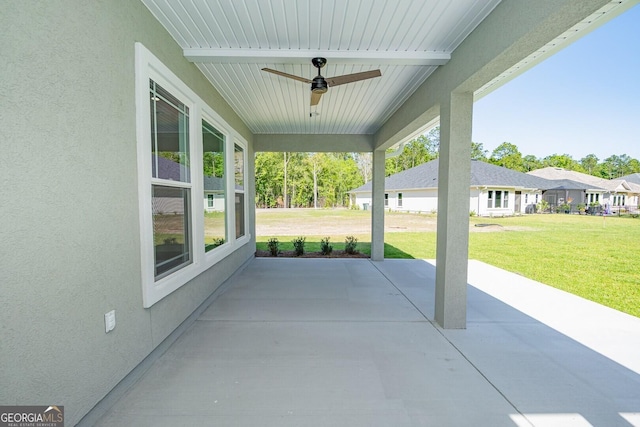 view of patio featuring a ceiling fan