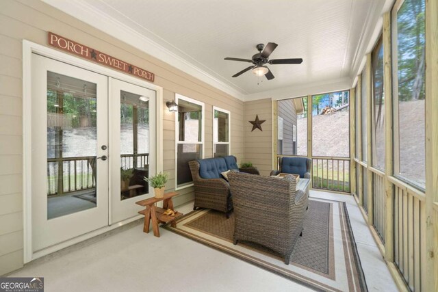 sunroom with french doors and ceiling fan