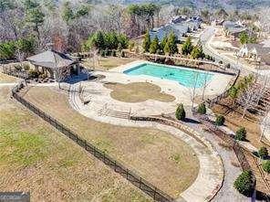 view of swimming pool with a fenced in pool