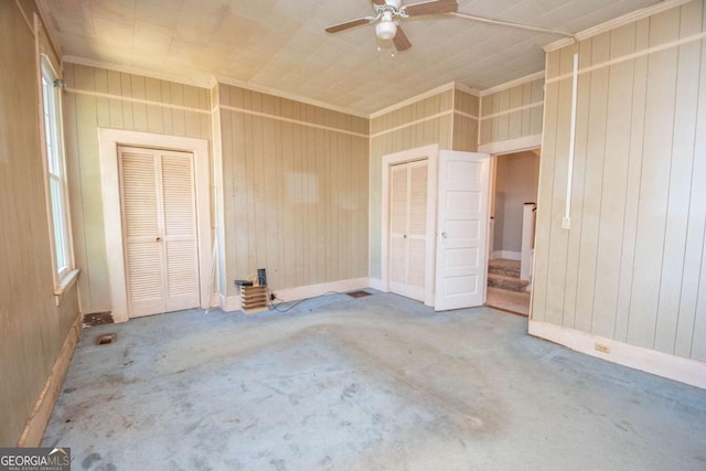 522 Park Ave, Lagrange, GA 30240 - unfurnished bedroom with wooden walls, carpet flooring, crown molding, and baseboards
