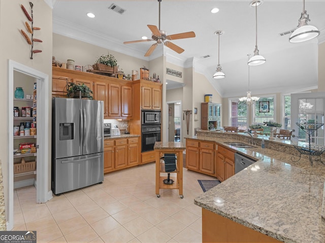 kitchen featuring visible vents, a sink, ceiling fan with notable chandelier, crown molding, and stainless steel appliances