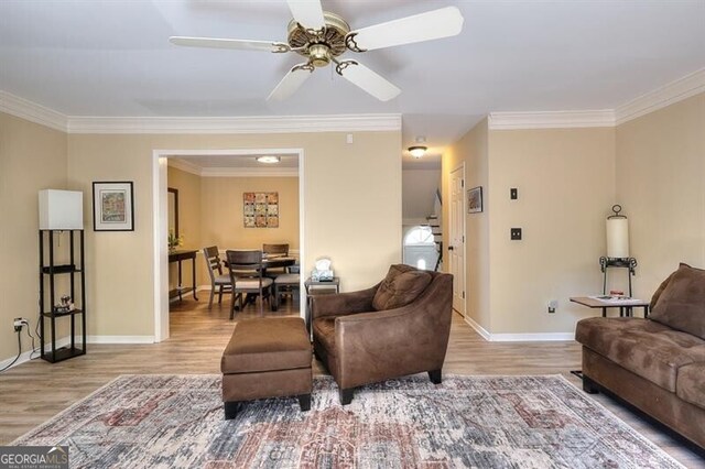 3716 Meeting St, Duluth, GA 30096 - living room with baseboards, crown molding, a ceiling fan, and wood finished floors