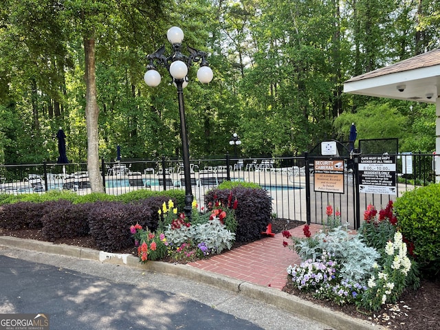 3716 Meeting St, Duluth, GA 30096 - exterior space featuring fence and a community pool