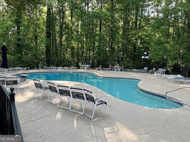 3716 Meeting St, Duluth, GA 30096 - pool with a patio and fence