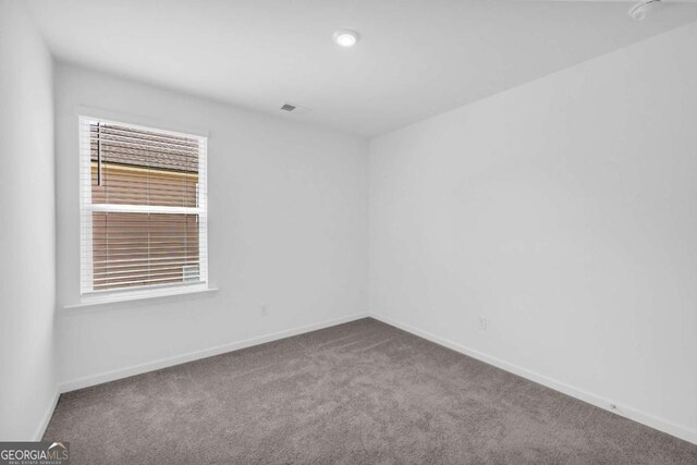 828 Evergreen Rd, Winder, GA 30680 - empty room featuring baseboards, carpet flooring, and recessed lighting