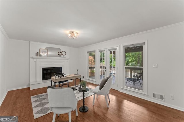 800 Breckinridge Rd SW, Marietta, GA 30064 - interior space with visible vents, a glass covered fireplace, wood finished floors, baseboards, and french doors