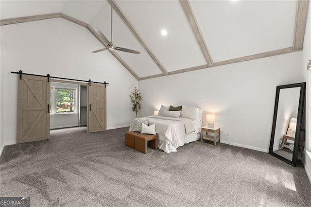 800 Breckinridge Rd SW, Marietta, GA 30064 - bedroom featuring baseboards, a barn door, carpet, and high vaulted ceiling