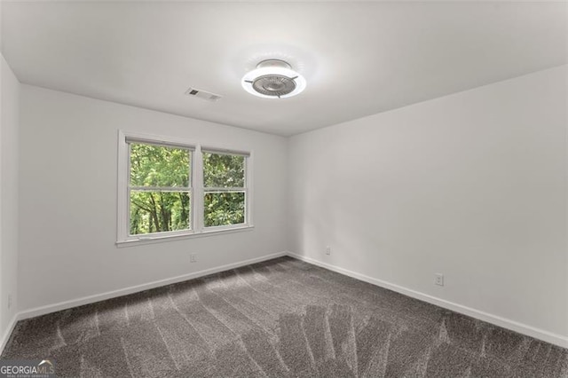 800 Breckinridge Rd SW, Marietta, GA 30064 - empty room featuring carpet floors, baseboards, and visible vents