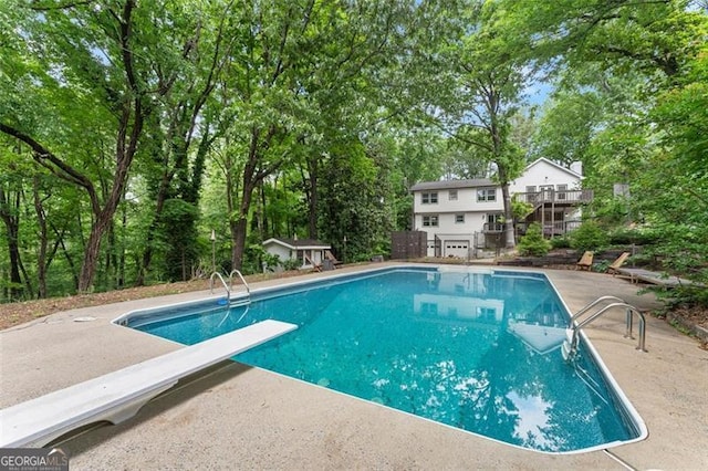 800 Breckinridge Rd SW, Marietta, GA 30064 - pool featuring a diving board and a patio area