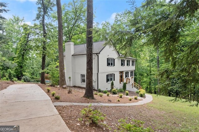 800 Breckinridge Rd SW, Marietta, GA 30064 - view of property exterior with a chimney