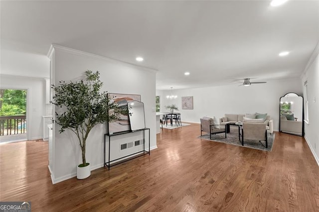 800 Breckinridge Rd SW, Marietta, GA 30064 - living area with ornamental molding, ceiling fan with notable chandelier, recessed lighting, and wood finished floors