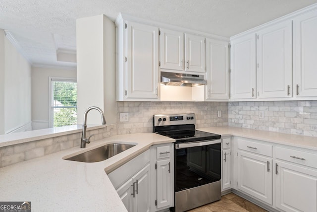 kitchen featuring crown molding, stainless steel range with electric stovetop, a sink, white cabinets, and under cabinet range hood