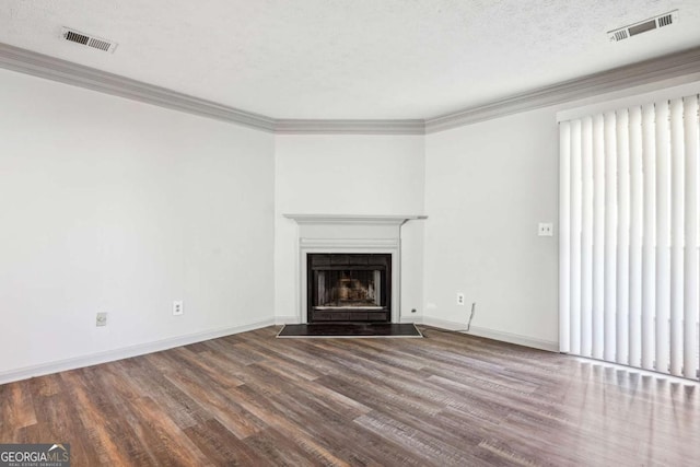 2047 Charter Ln, Lithonia, GA 30058 - unfurnished living room featuring a fireplace with flush hearth, wood finished floors, and ornamental molding