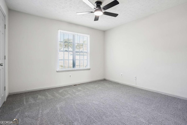 2047 Charter Ln, Lithonia, GA 30058 - carpeted spare room featuring a ceiling fan and a textured ceiling
