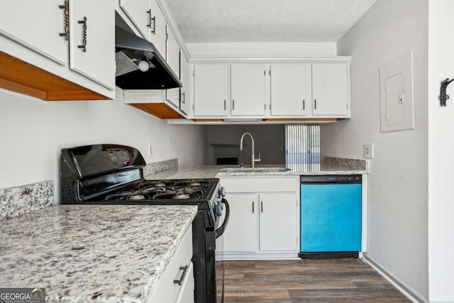 2047 Charter Ln, Lithonia, GA 30058 - kitchen with dishwashing machine, gas stove, under cabinet range hood, dark wood-style flooring, and white cabinetry